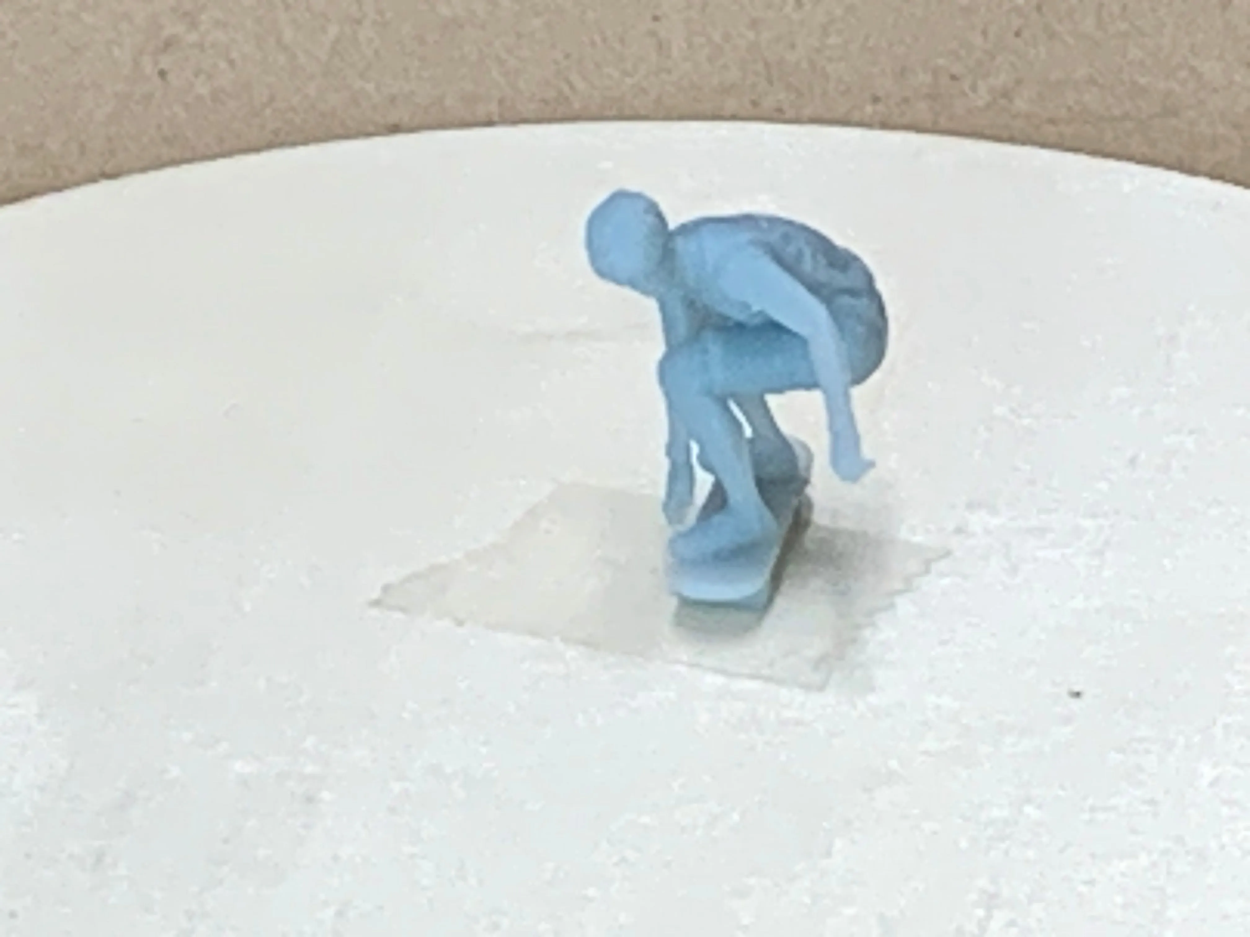Skateboarding Dan Crouching